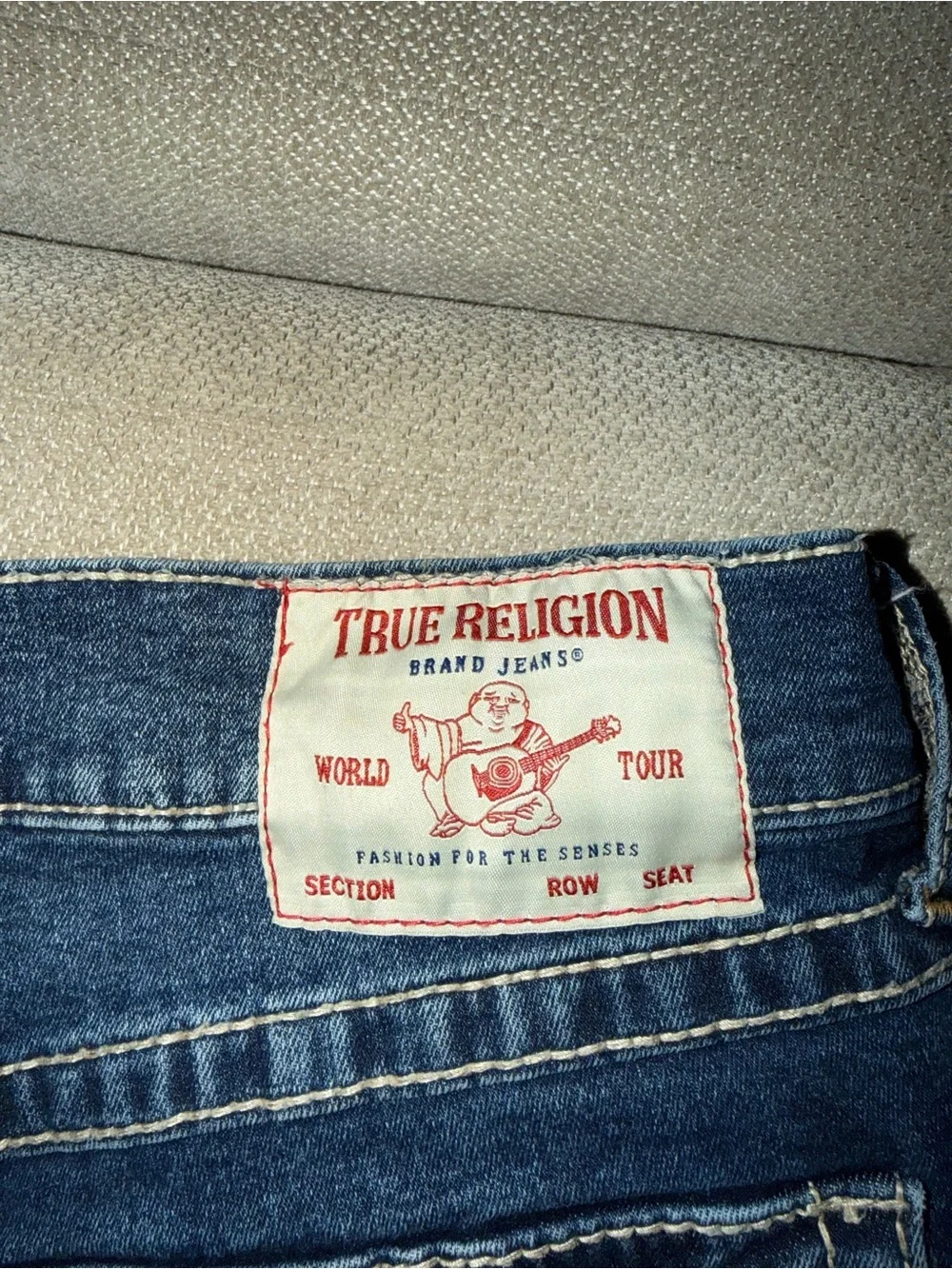 True Religion Dark Blue Jeans with Signature Pocket Stitching